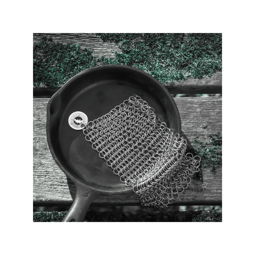 black and white photo of chainmail scrubber